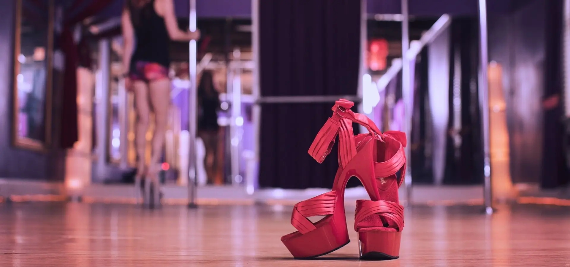 Red platform heels on the studio floor